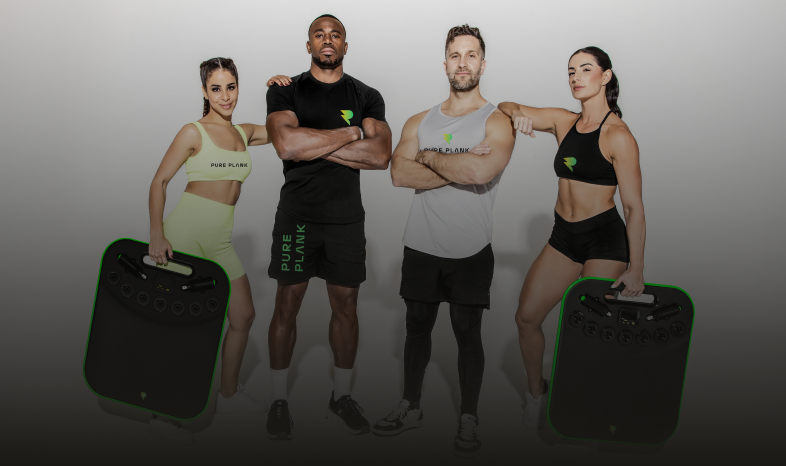 Four people in athletic wear posing with Pure Plank fitness equipment.